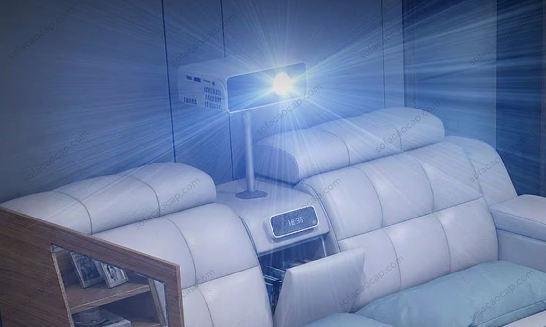 Máy chiếu phim mini nằm ở phía đầu của giường massage đa năng GMX 044